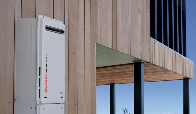 Rinnai hot water unit on house with water in background