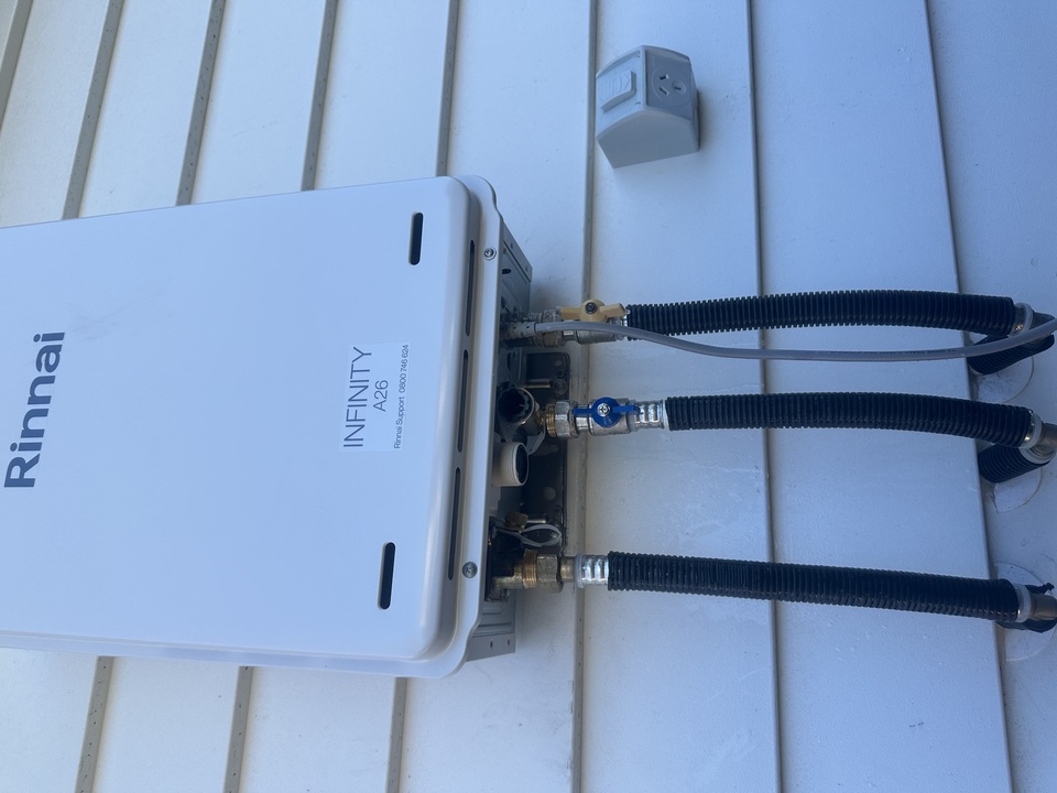Close up of Rinnai Infinity on weather board house