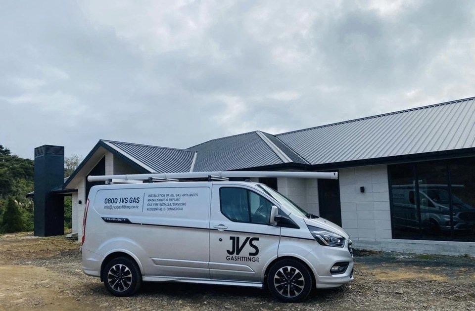 JVS Gasfitting van in front of new build