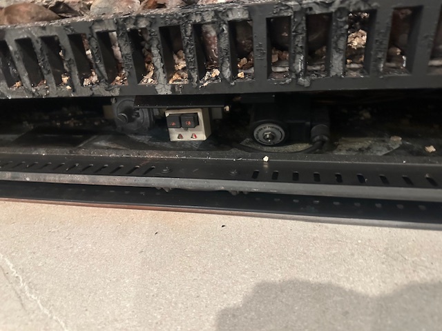 Close up og gas fire before its refurbishment