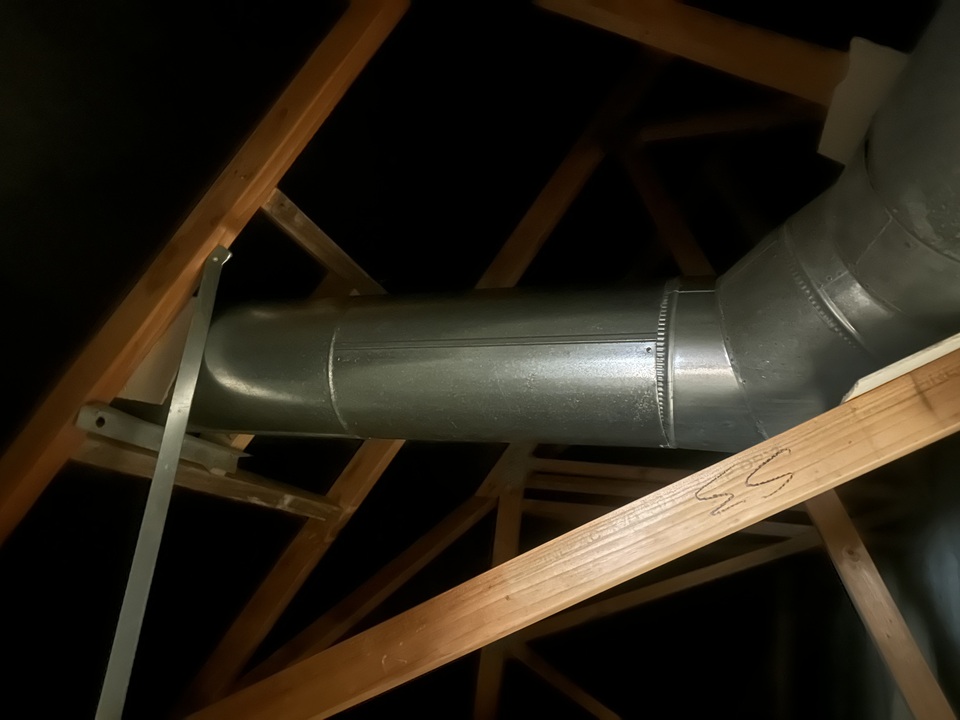 Flue installed in roof space