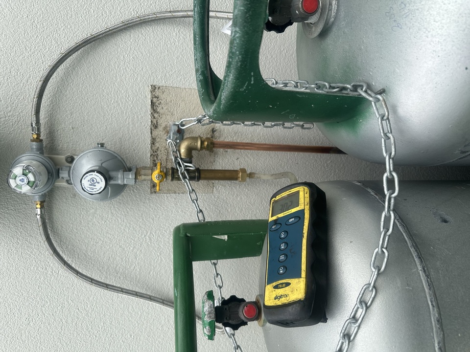 Gas bottle set up showing gas regulator